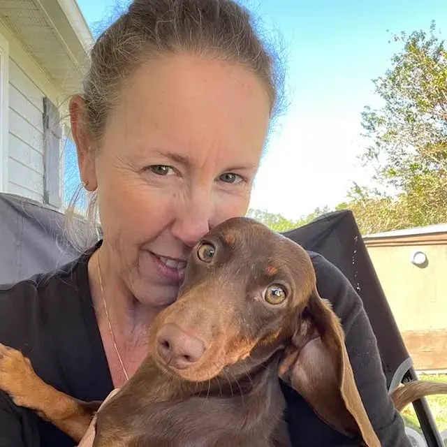 Kelli Hoggard of Irish Rose Acres with one of her Miniature Dachshunds